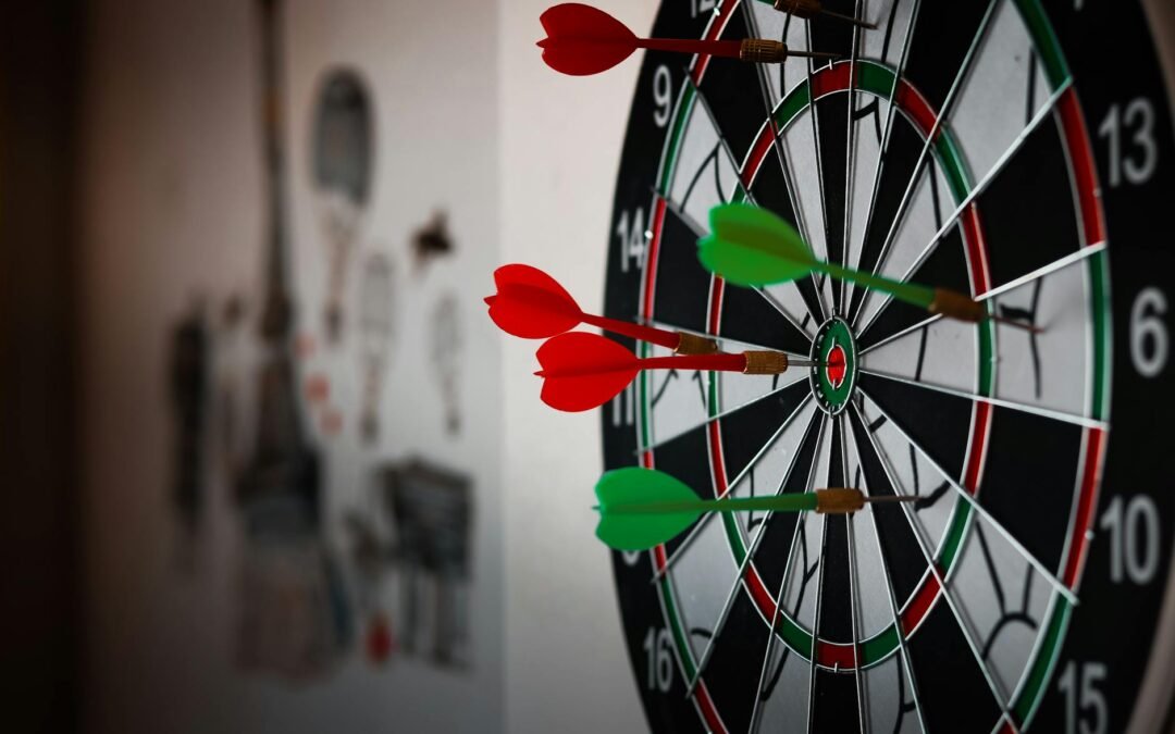 close up photo of dart pins on dartboard