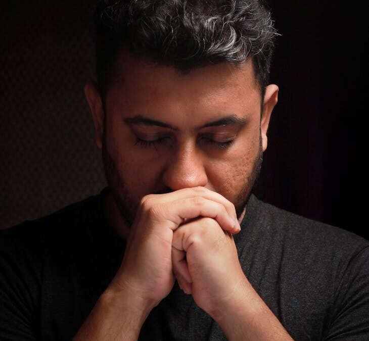 portrait of man with eyes closed