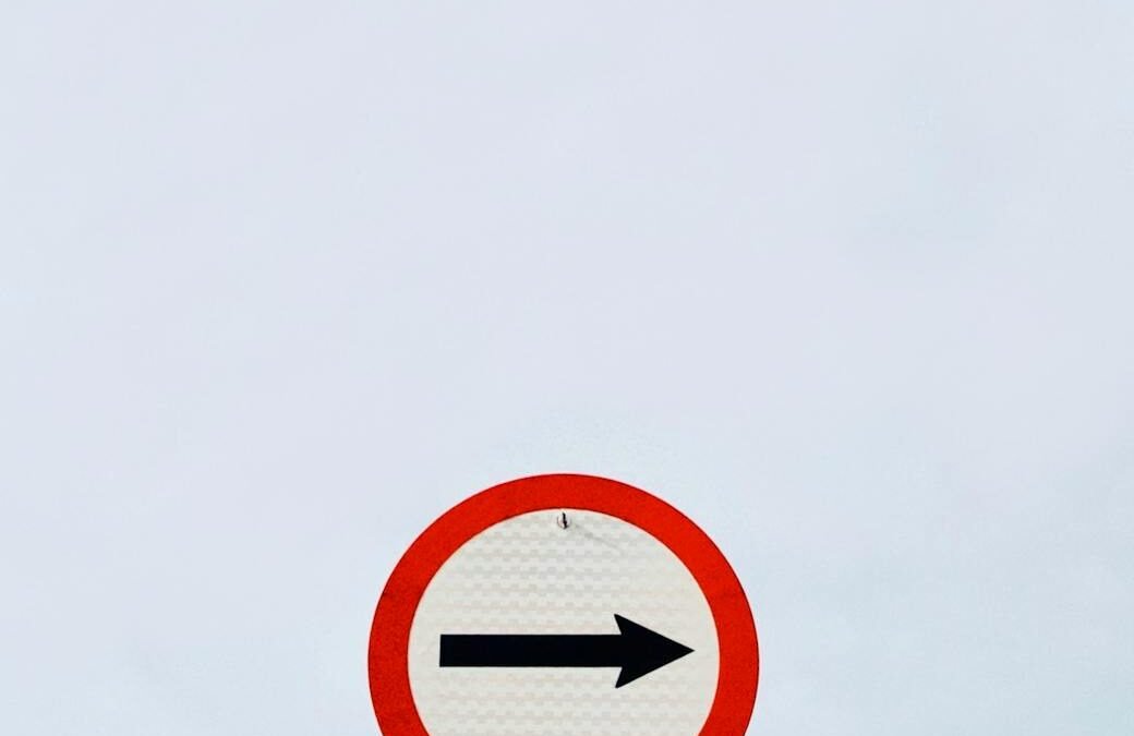 traffic sign by the sea