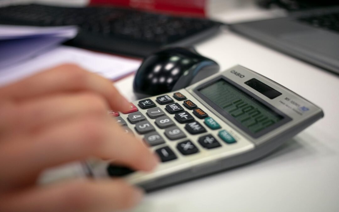 person using a calculator