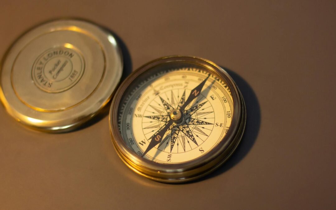 antique compass on a table