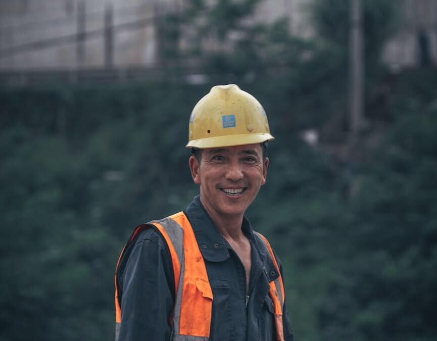 a man wearing yellow helmet