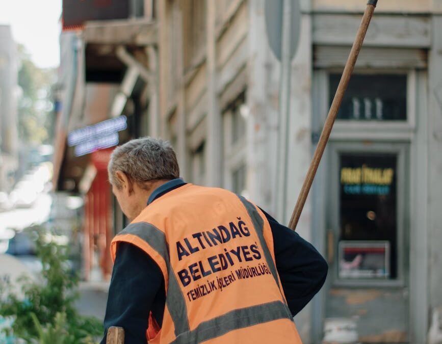 man cleaning on a street
