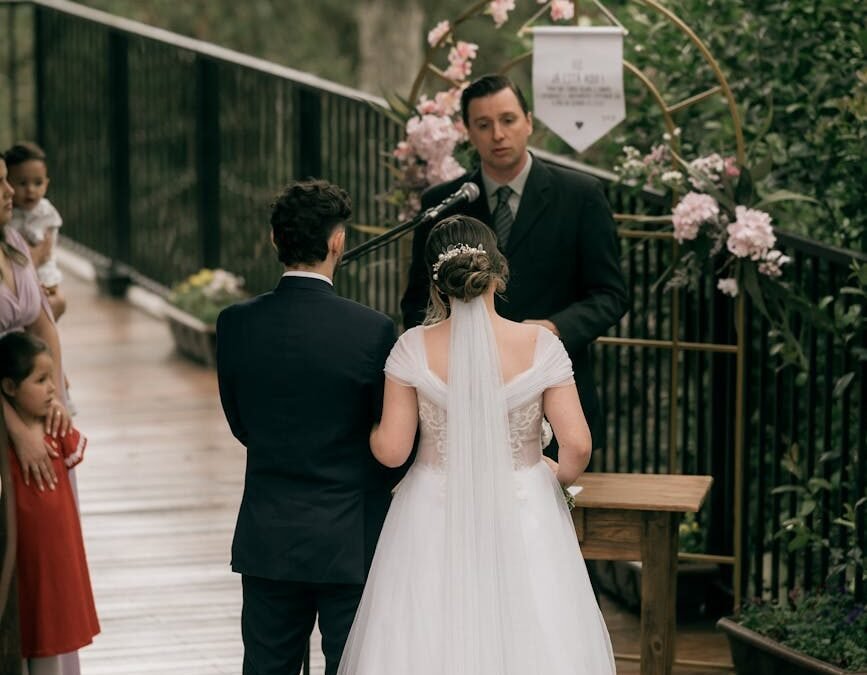 beautiful outdoor wedding ceremony with bride and groom