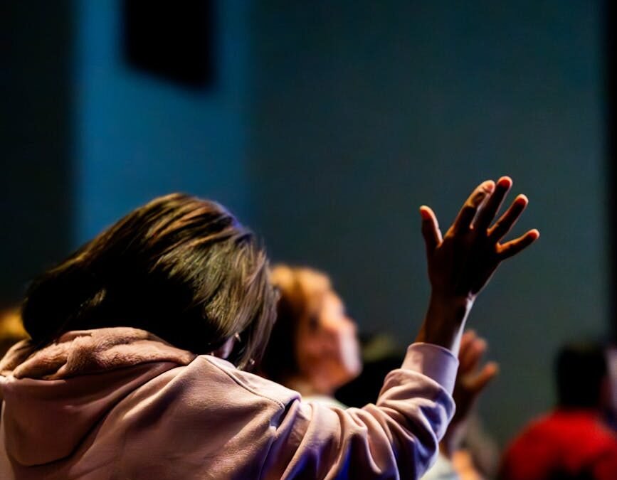 people praying during mass