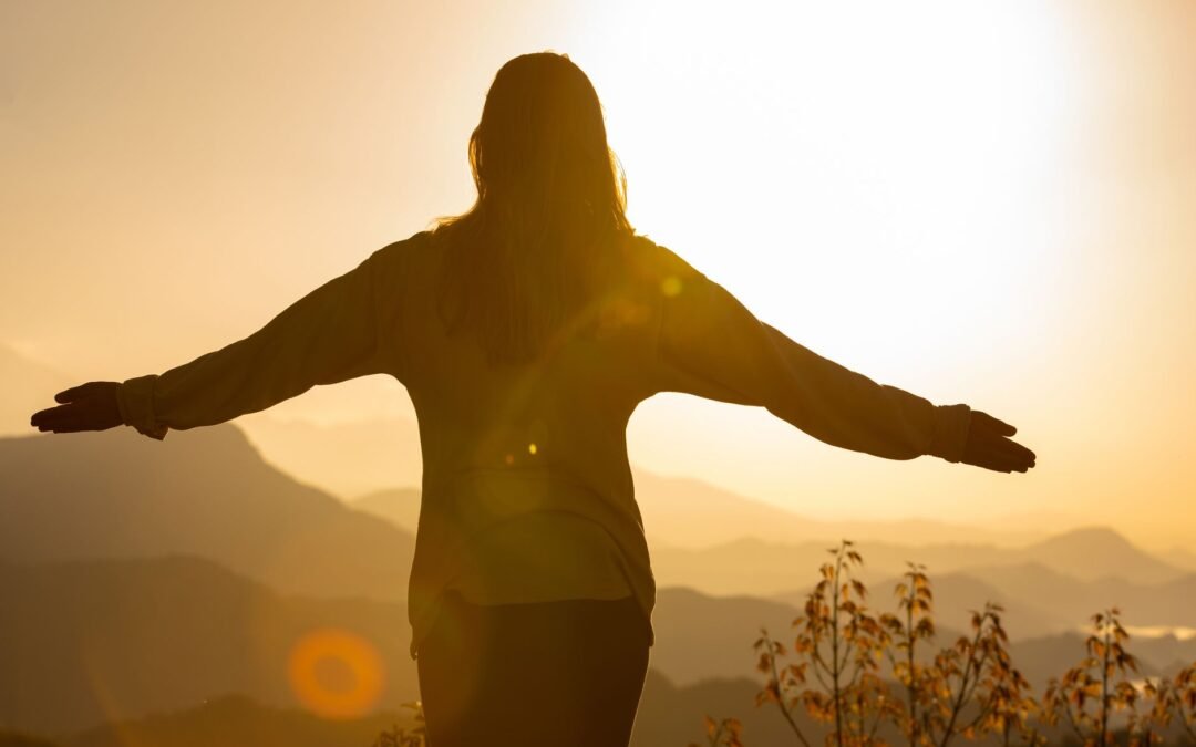 back view photography of woman in long sleeve shirt