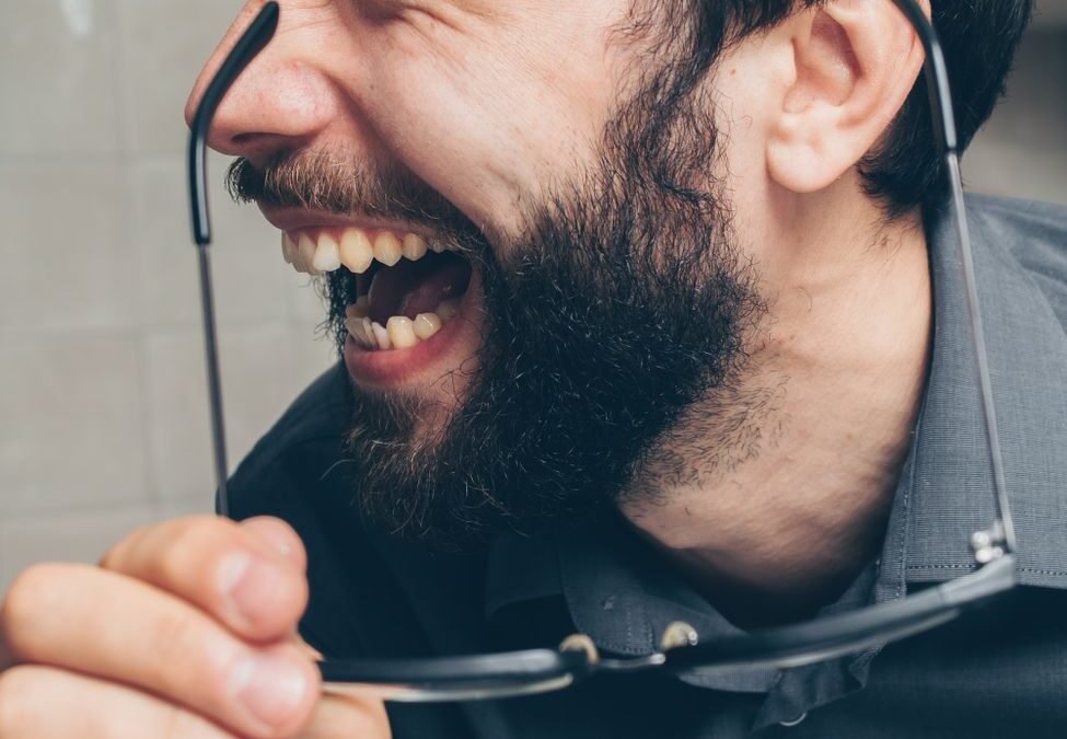close up photo of a laughing man