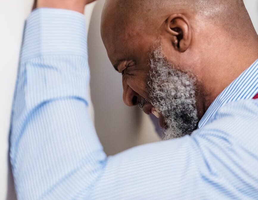 close up photo of an upset man