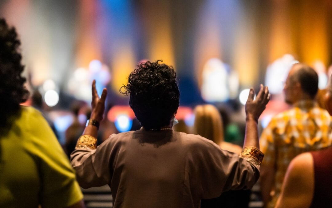 a woman with her hands up