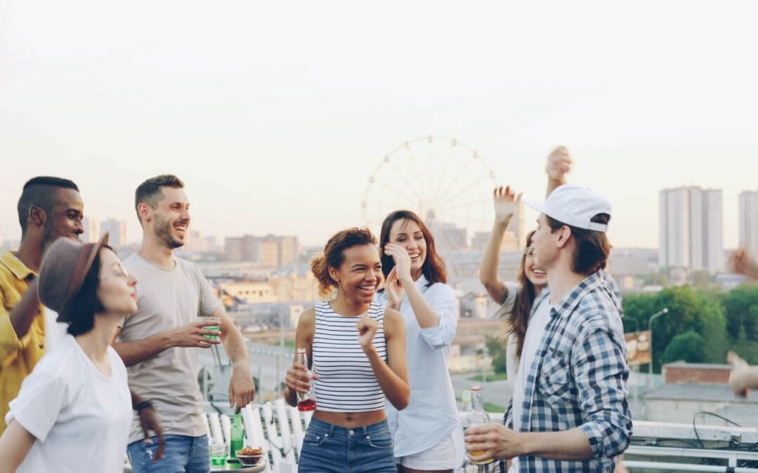 group of friends celebrating on rooftop party