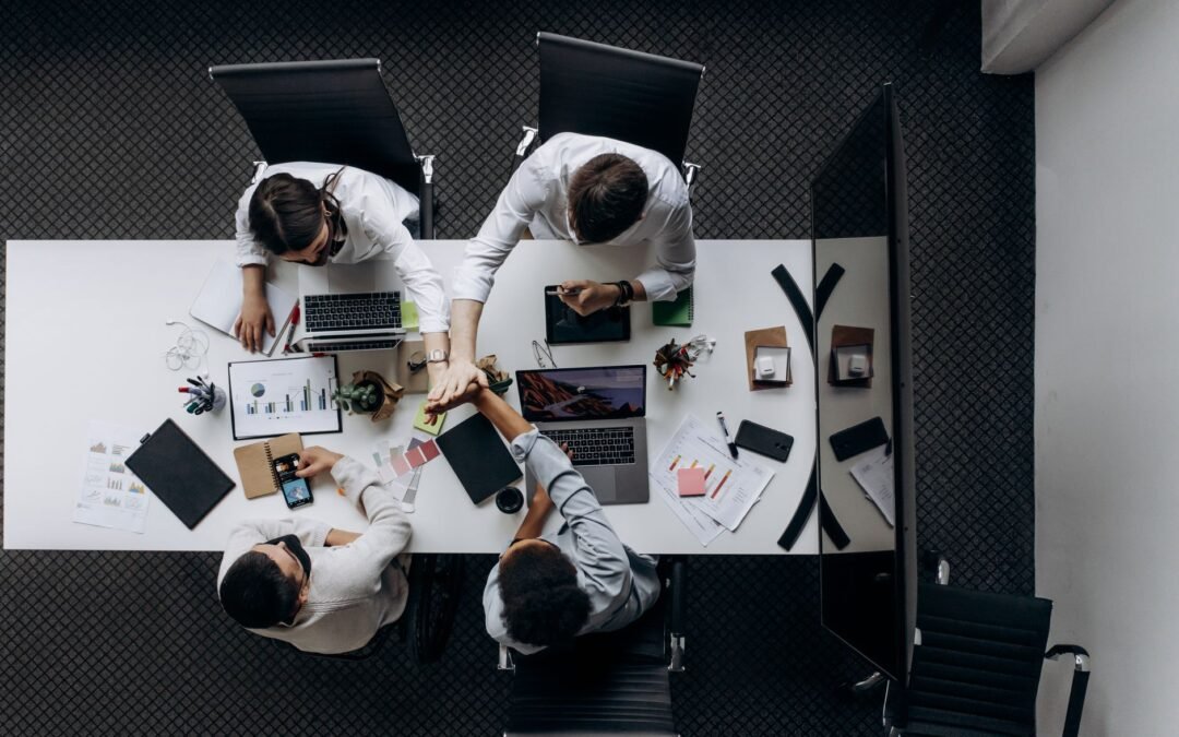 people sitting around the conference table