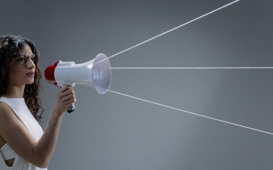 a woman holding a megaphone