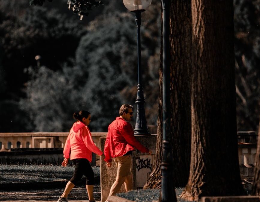 married couple taking a walk in the park