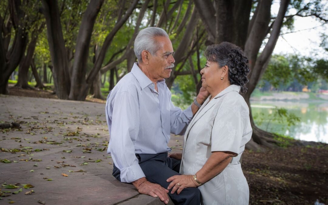 elderly couple looking at each other